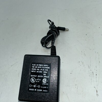 Plug In Power Supply Model No. PI-35-24D DC12V Telephone Power Adapter Used