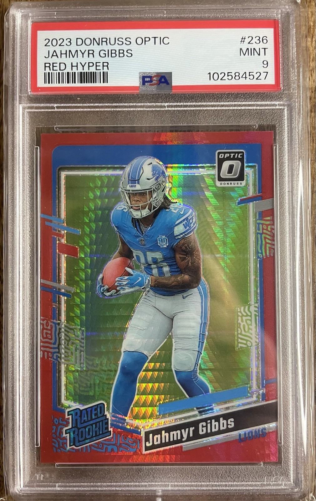 2023 Panini Donruss Optic Red Hyper Prizm #236 Jahmyr Gibbs RC PSA 9