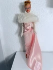 New ListingVintage Blonde Swirl Ponytail Barbie Doll with a Cute Hairstyle in a pink gown