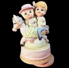 CAROUSEL MUSICAL FIGURINE PONY BOY GIRL ROTATING VINTAGE SMALL WORLD AFTER ALL
