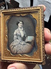 woman with an open book 6th plate daguerreotype