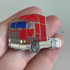 Vintage International 9700 Red Aero Semi Truck Lapel Pin Trucking Cabover