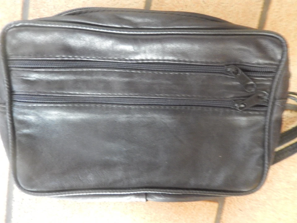 Pochette homme en cuir - Photo 1/2