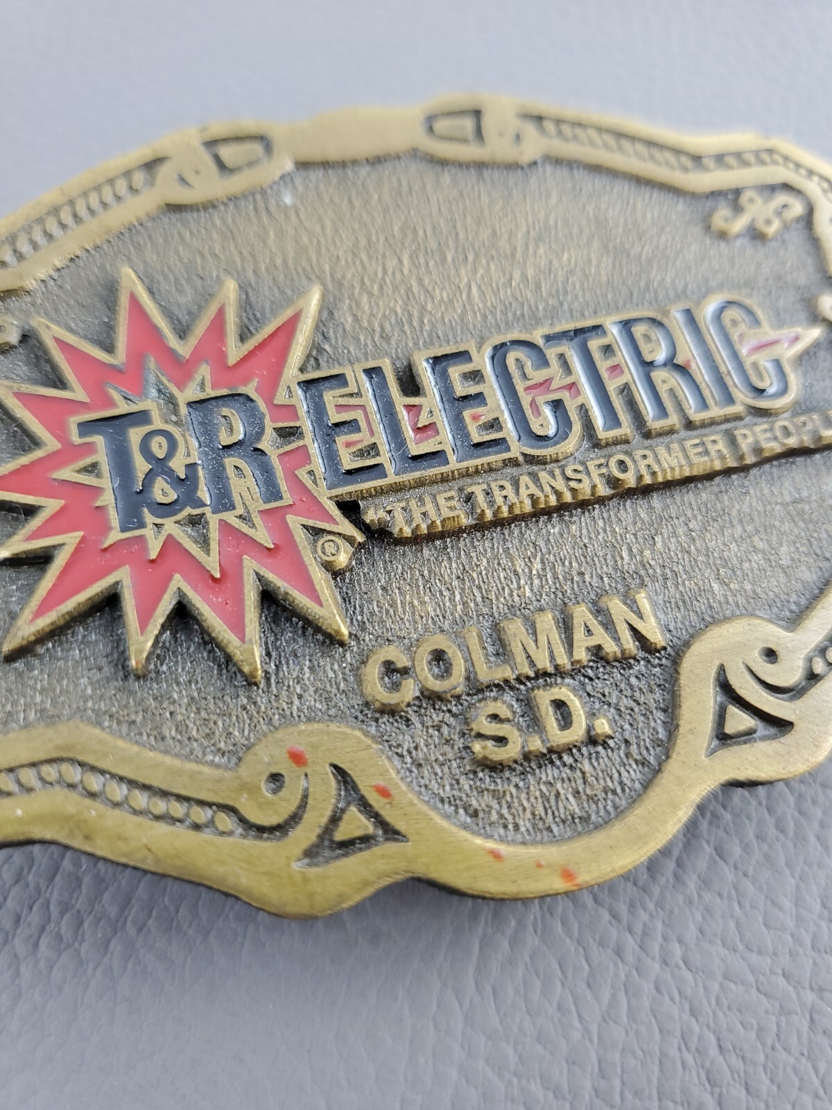 Vintage T&R Electric Brass Advertising Western Belt Buckle / Colman SD
