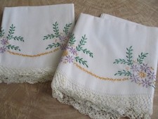 pair of standard size pillow cases purple stitched flowers