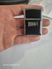 The item shown is a Zippo 355 Black Ultralite High Polish Chrome lighter