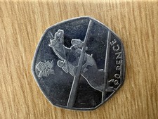 A 2011 United Kingdom 50 pence coin featuring the Olympic Equestrian event