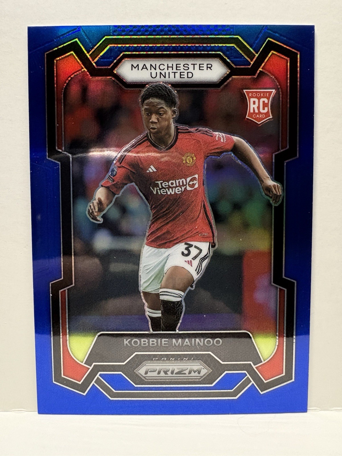 2023-24 Panini Prizm Premier League - Kobbie Mainoo #38 Blue Prizm /299