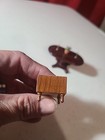 Miniature Dollhouse Table With Decor Attached And Unfinished Wood Sofa — photo 5