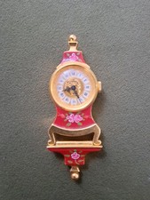 montre pendentif SINDACO dorée rouge, fleurs, chiffres romains