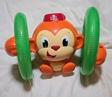 Bright Starts Roll Glow Monkey Toy with Lights and Melodies, Ages 6 months
