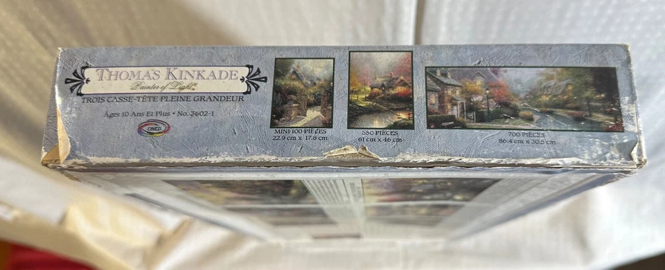 10 PUZZLES DIFERENTES - ROMPECABEZAS THOMAS KINKADE a través de 3 DIFERENTES 3 PAQUETES Y 1 SOLO Foto 3 de 4