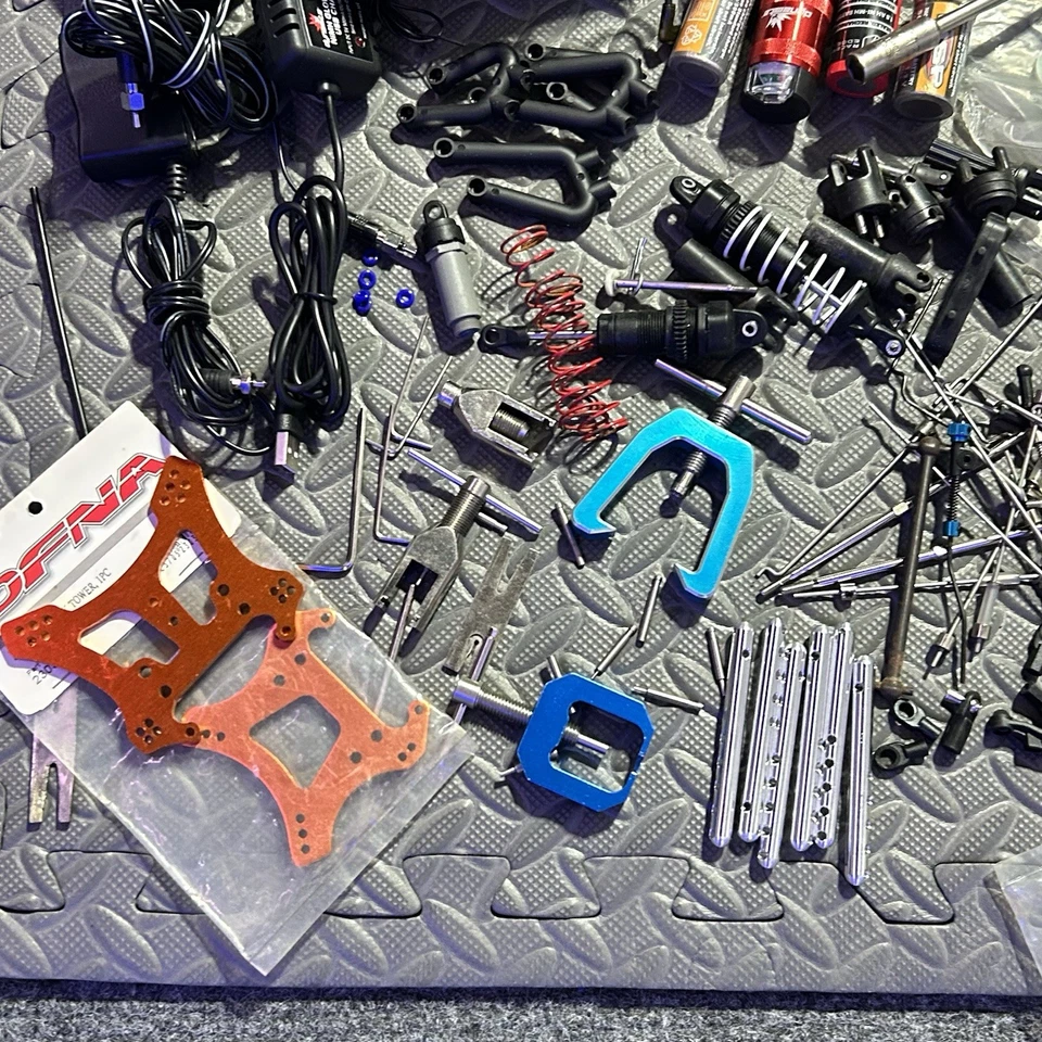 RC Nitro Tmaxx Clutch Bells Exhaust HPI Savage Roto Start Glow Plugs Parts Lot - Image 3 of 4