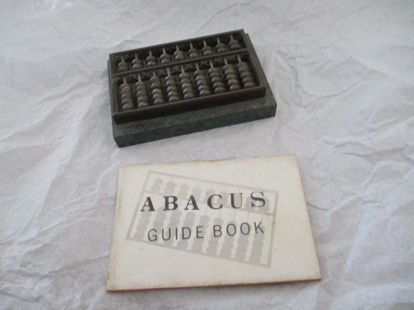 mini abacus with book  vintage heavy paperweight 3.5x2.5