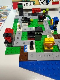 LEGO Games: City Alarm (3865) comes with all minifigures on Missing large Die