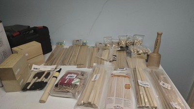 A variety of wooden blocks, dowels, and balls for woodcarving