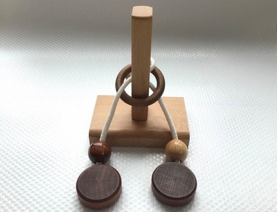Denkspiel - Knobelspiel - Geduldsspiel aus Holz  Wie befreie ich den Ring
