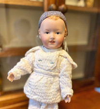 Beautiful reproduction porcelain doll of rare Heubach 8649 Bonnet baby