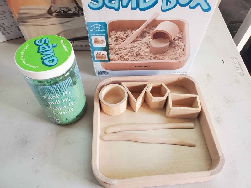 Brookstone table top Sand Box, Molds, mess free Sand, Toy Set