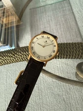 universal geneve 18k gold watch