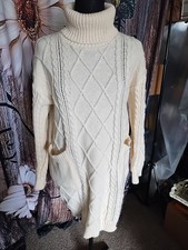 high-neck cable knit sweater dress with double pockets. Size S