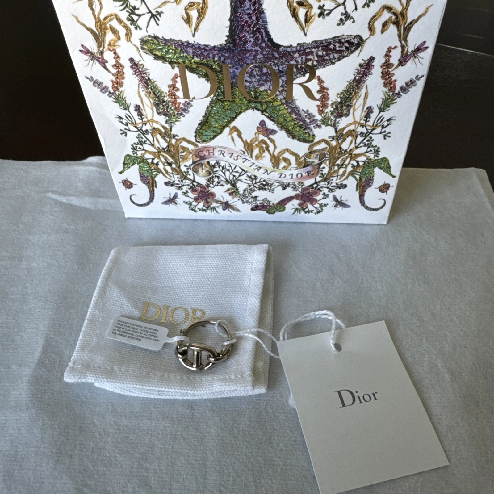 BAGUE CD NEUVE avec étiquette Christian Dior WCJ ton argent taille M bijou