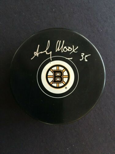 ANDY MOOG AUTOGRAPHED BRUINS PUCK  NEW ENGLAND PICTURE C.O.A. - Picture 1 of 3