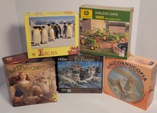 Group of 5 brand new large jigsaw puzzles,never opened, still sealed.