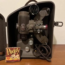 Vintage Bell & Howell 16mm Filmo Diplomat Projector w/ Case As- w/puddy pup film