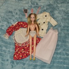 Gorgeous Pippa Doll and 3 sets of clothing, pants and shoes