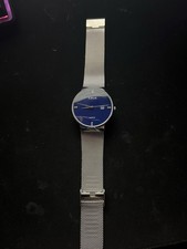 LIGE quartz watch with a blue face and a silv...