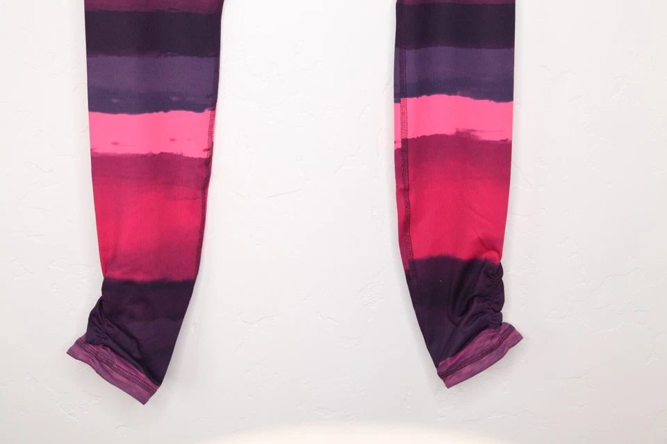  Pantalones de mujer Brooks reversibles Greenlight Tight SE NUEVOS CON ETIQUETAS azul marino paisaje/flor claro XS Foto 3 de 4