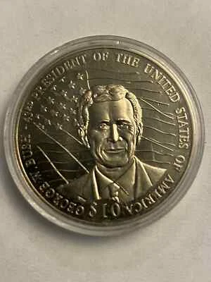 2004 Republic of Liberia $10 George Bush Unc. Encapsulated - Image 1 of 2