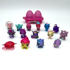 Hatchimals CollEGGtibles Lot of 15 Glitter Sparkle Figures w Pink Egg Case