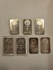 Lot of 7 - 1 Troy oz. Morgan Design .999 Fine Silver Bars