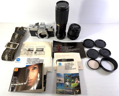Minolta SRT-101 35mm SLR Film Camera with 2 Lenses Strap Cap Covers Manuals