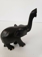 Estatuilla de madera tallada a mano trompa de elefante negro