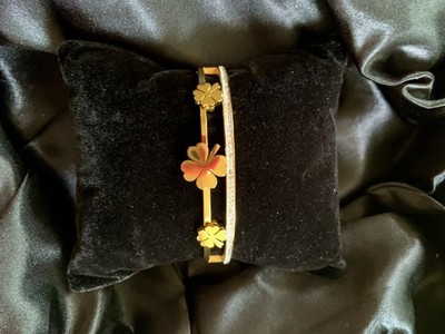 Two in one gold bangle with leafs and sparkling bangle