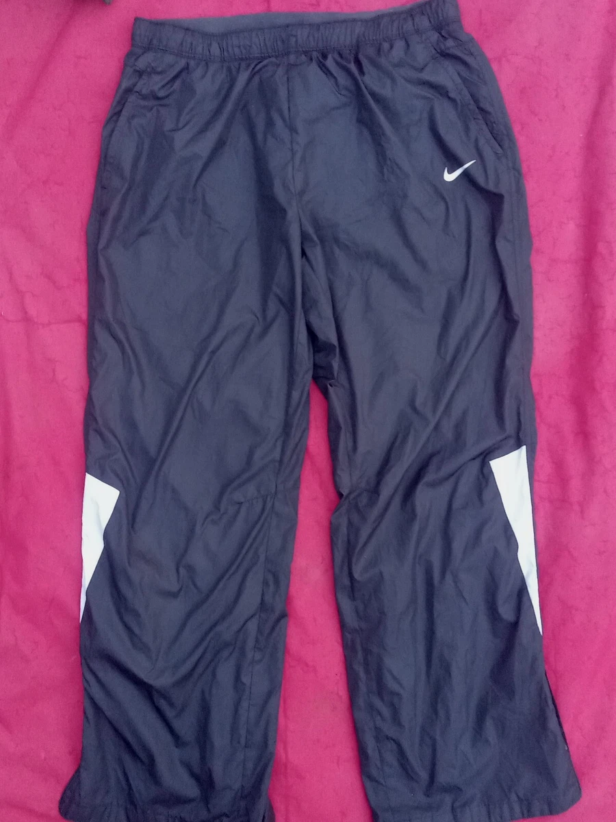 Nike golf storm fit pants top