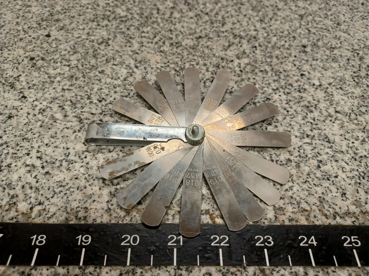 Snap on feeler gauge outlet