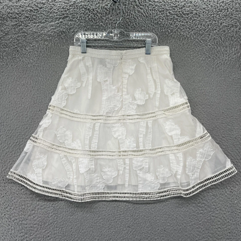 Falda Alexis Mujer Pequeña Blanca Malla Transparente Apliques Florales Niveles Línea A Mini Foto 2 de 4