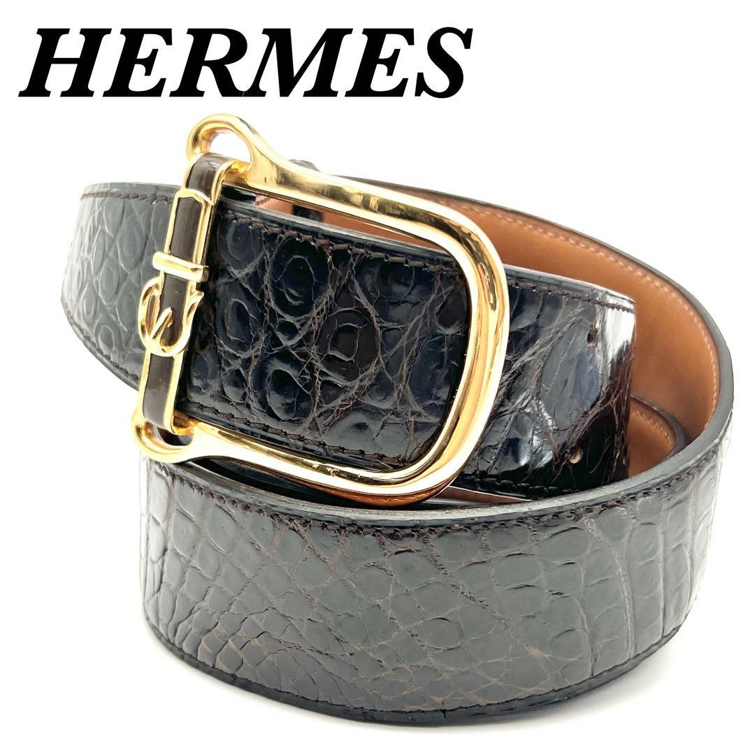 Exclusive Hermes crocodile belt in black and brown with metal fittings
