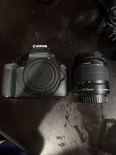 Canon EOS Rebel T100 DSLR Camera with 18-55mm Lens, Charger, and Batteries