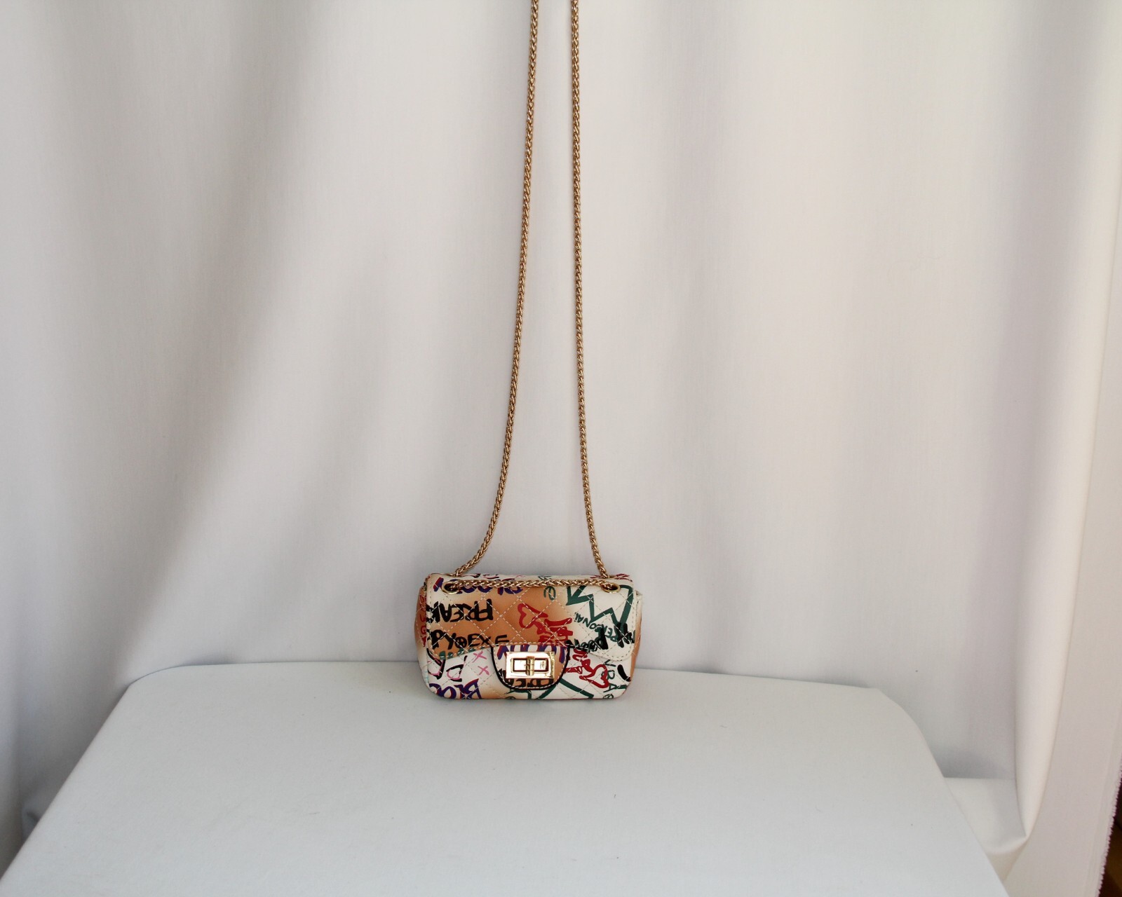 Graffiti Quilted Designer Inspired Bag with Gold Chai… Gem