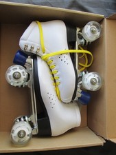 Galaxy white qaud roller skates