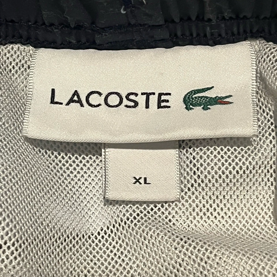Мужские плавки Lacoste темно-синие с логотипом крокодила по всему телу размер XL - Изображение 4 из 4