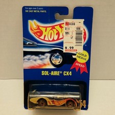 1991 Hot Wheels Gold Medal Speed Sol-Aire CX4 No 254 Racecar Diecast Car on Card