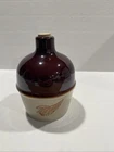 1990 red wing commemorative 1/2 pint brown top jug.