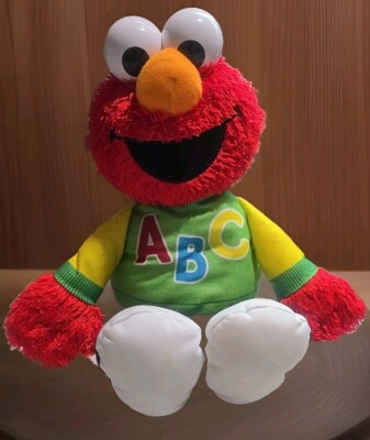 Sesame Street Language Learning Elmo Plush Spanish/English works great!