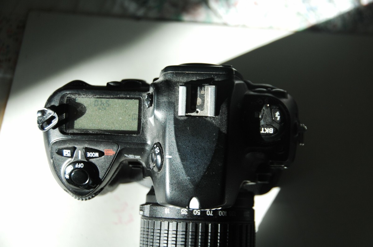 Nikon D2X, 146,302 shots, Tamron 18-200mm XR DiII AF lens, charger